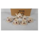 Miniature beige and apple tea set, includes four