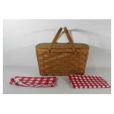 Picnic basket with two tablecloths, basket is