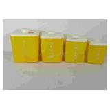 Yellow canisters, marked flour, sugar, coffee,
