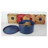 Round tin full of records, includes Aurthor