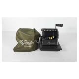 The Paymaster machine with case and key