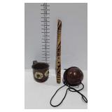 3 pieces: wind instrument,  clay mug, purse