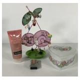 Earrings on holder, curling iron, acne wash,