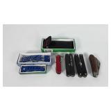 Seven pocket knives, three include boxes