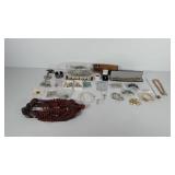 Box of jewelry, includes necklaces, rings,