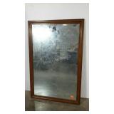 Wooden framed wall mirror. 27"×41".
