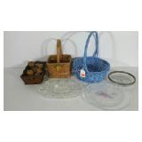 Two baskets, clear glass wares, wooden decor in a