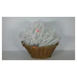 Wicker basket, 24" diameter oval, full of plastic