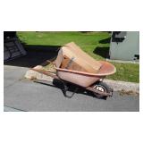 Wheel Barrel poly tub in used condition and 4