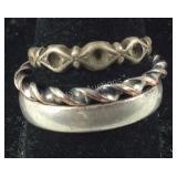 Three rings two are sterling Silver  Bands/Rings ,