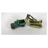 Metal toys, Strutco Hom-Pah dump trick and Tonka