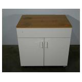 Storage cabinet on wheels. Great for garage or