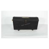 Footed wooden trunk with rope handles. Measures