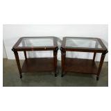 Pair of end tables with beveled glass tops. Some