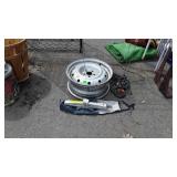 Group lot: Subaru wheel, cb Antenna,  Toyota jack