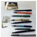 Nine fountain pens and extra nibs