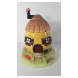 Egg shaped house cookie jar, has flea bites