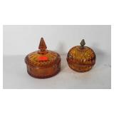 Two Amber glass covered candy dishes