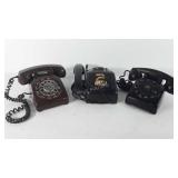 Three rotary telephones, includes one wall