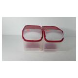 Two Tupperware food storage containera