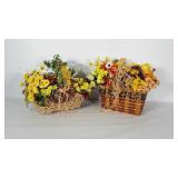 2 Floral arrangements in baskets. One basket is