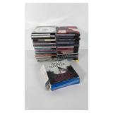 Music CDs and The Fifth Assassin audiobook