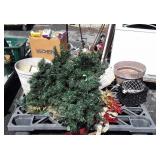 Skid with Christmas tree parts, planters, wreath