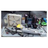 Skid with Oreck vacuum cleaner, fan, parts to a