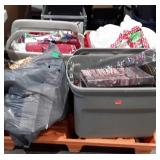 Totes filled Christmas,  bulbs, greenery,  bags,