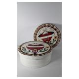 Two painted wooden cheese boxes with dove design,