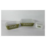 Three covered pyrex dishes with spring blossom