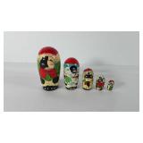 Wooden Christmas cow nesting dolls, paint is
