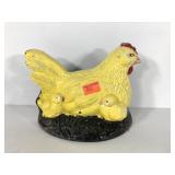 Cast iron hen and chicks door stop, paint loss as