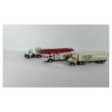 Three Hess gasoline trucks, includes two coin