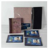 Six photo albums, one includes pictures, Seller
