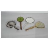 4 hand mirrors. 1 is 2-sided. Conditions are as