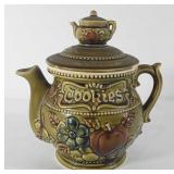 Teapot style cookie jar, lid has been repaired,