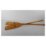 Pair of Feather Brand wooden paddles, 46" long