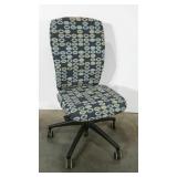 Office desk chair in modern fabric. No longer