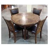 Round table with undershelf and four chairs by