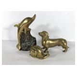 Brass statues,  dolphin, snail and dachshund