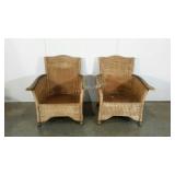 Pair of rattan arm chairs, no pads, discoloration