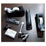 Office supplies, stapler with staples, paper