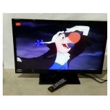 Seiko 32" flat screen TV on stand with remote.