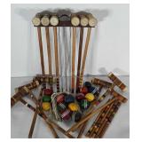 Croquet game pieces. Enough pieces here for one