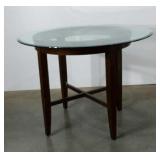 High table with thick beveled glass top. 48"