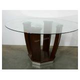 Large glass top table. 54" diameter and 30" high.