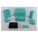 Tiffany and Co. boxes and gift bag, and one J.
