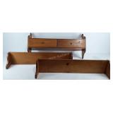 Group of floating wooden shelves, one with