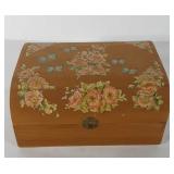 Wooden chest with floral decoupage filled with